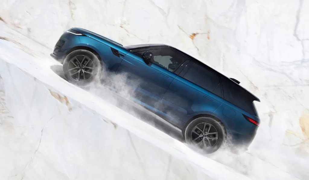 2. Range Rover Sport Electric - Two 260 kW electric motors produce a combined 404 kW and 850 Nm - blue variant racing uphill