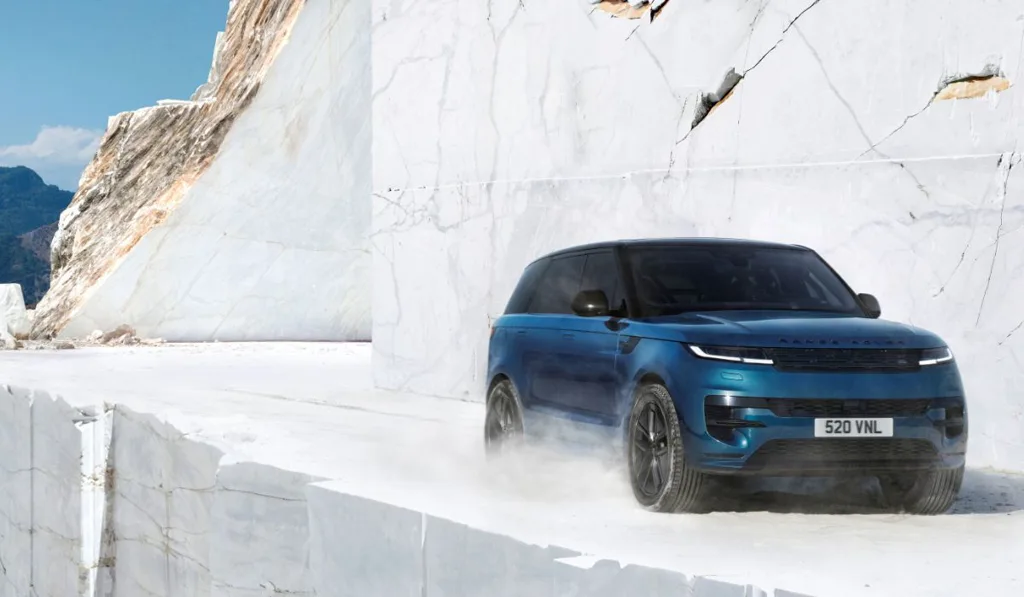 4. Range Rover Sport Electric - The 118.5 kWh usable battery delivers up to 609 km - blue variant high speed off road quarry