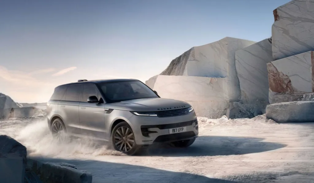 6. Range Rover Sport Electric - Top speed is limited to 200 km/h - Grey variant high speed off road corner